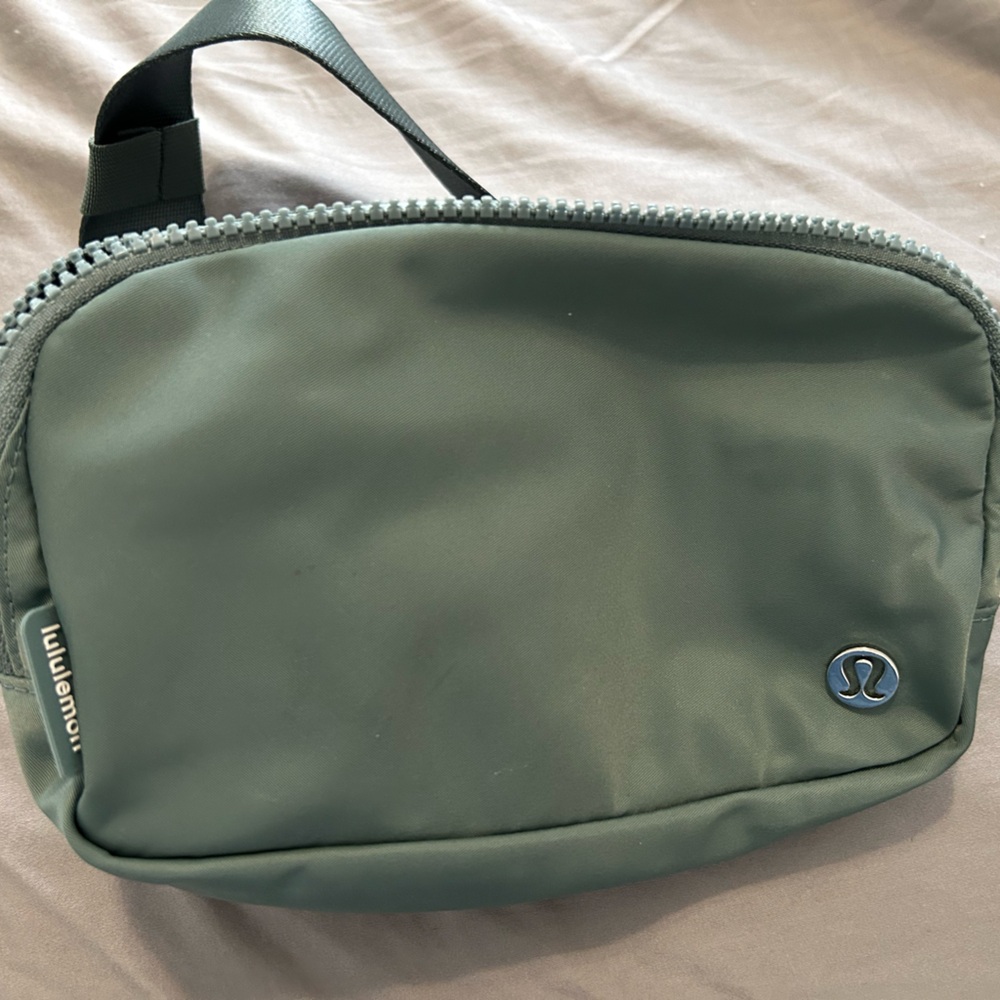 lululemon athletica small crossbody bag in dark green